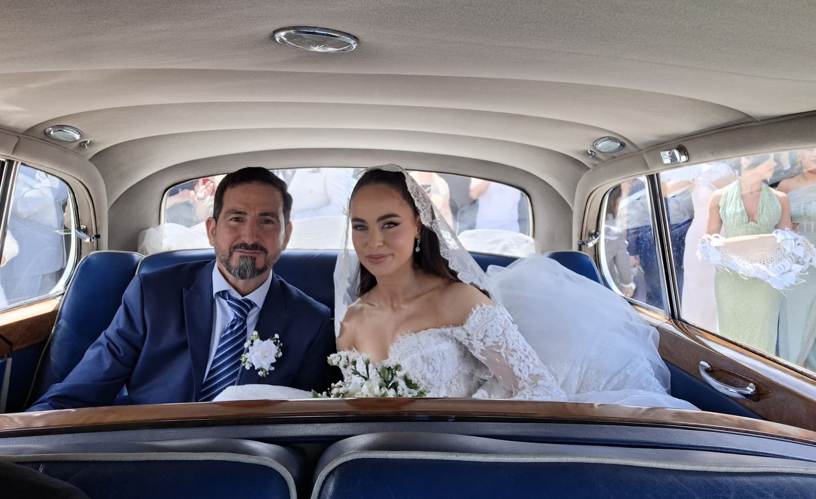 Vintage Rolls-Royce, the wedding couple on board
